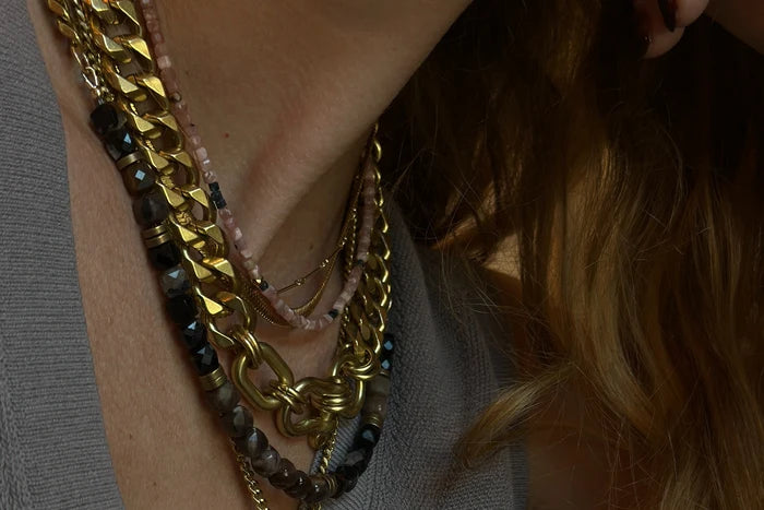 Rachel Nathan Petrified Wood & Tourmaline necklace shown on model, close view at the neckline