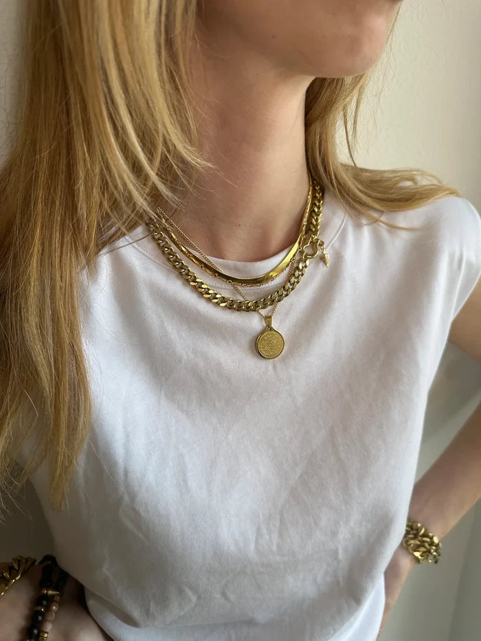 Rachel Nathan Shackle Single: Art Deco Drop necklace shown on model