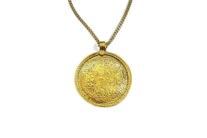 Rachel Nathan Shield necklace, close view of the Indian brass shield medallion