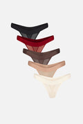 Five pairs of sheer thongs in different colors are stacked vertically on a light gray background. The colors are black, dark red, brown, beige, and off-white.