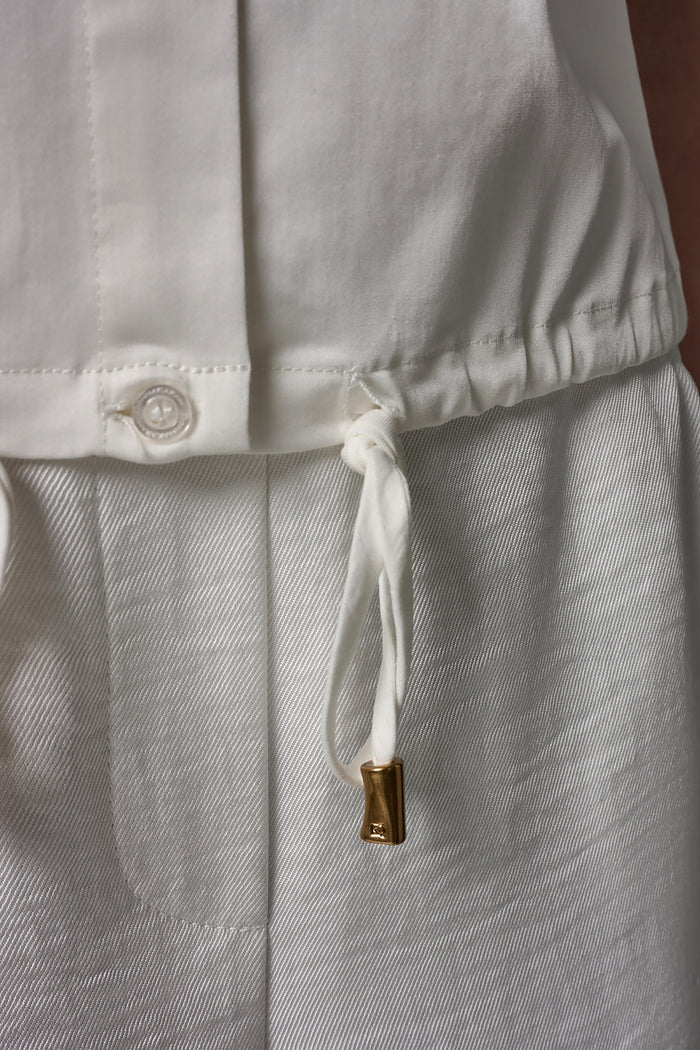 SLEEVELESS DRAWSTRING HEM BLOUSE